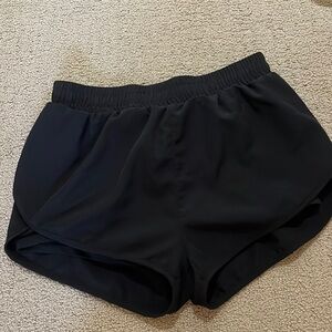 Black athletic 2 layered shorts. HAS POCKETS
